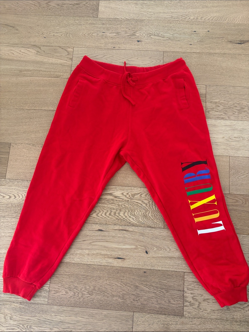 Fashion Nova Red 'LUXURY' Graphic Joggers